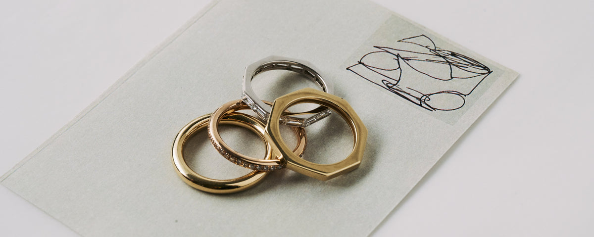 Octagonal and round rings in yellow, rose and white gold with baguette and pavé lab-grown diamonds on a design sketch - Daure collection