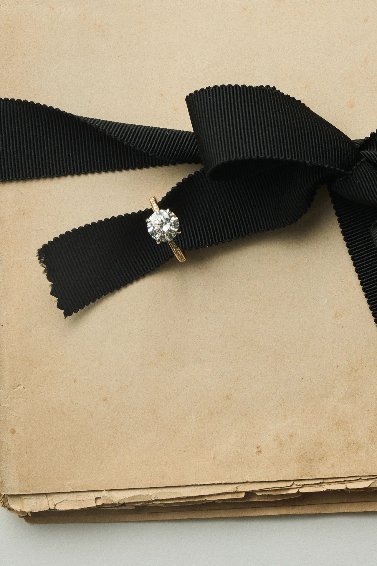 Yellow gold solitaire diamond engagement ring with black grosgrain ribbon - Daure collection